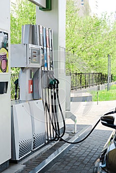 Focus of automobile refueling with benzine on gas station