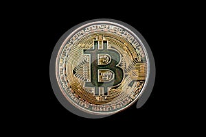 Focus of Bitcoin Symbol Cryptocurrency on black background isolate