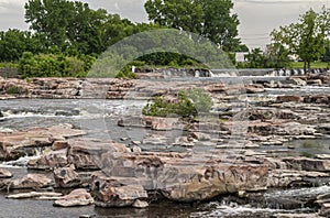 Focus on the cascade of waterfalls, Sioux Falls, SD, USA