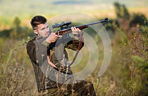 Focus and concentration of experienced hunter. Hunting and trapping seasons. Hunting permit. Man brutal gamekeeper