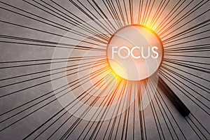 Focus concept with magnifying glass photo