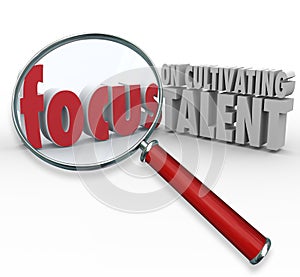 Focus on Cultivating Talent Words Magnifying Glass Finding Employees photo