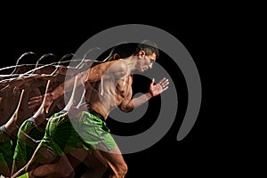 Focus and determination. Shirtless, muscular man in motion, training, running against black background with stroboscope