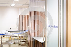 Focus on the door of an emergency room in the hospital