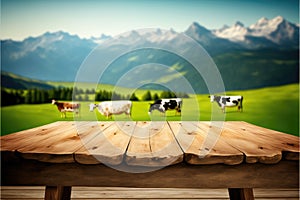 Focus empty wood table with blurred natural tree and cow with meadow background.