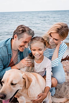 Focus of father hugging daughter near