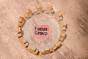 Focus Group text on notepad, concept background