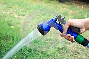 Focus on the hand image Tree sprinkler