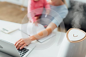 Focus of humidifier on table near