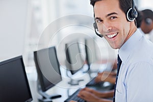 Focus on a joyful call centre agent