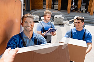 Focus of loader giving cardboard box