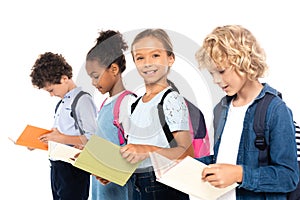 Focus of multicultural schoolkids with backpacks