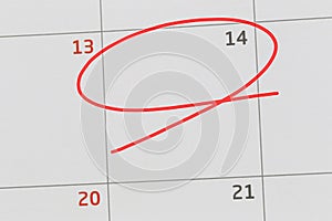 Focus on number 14 in calendar and empty red ellipse.