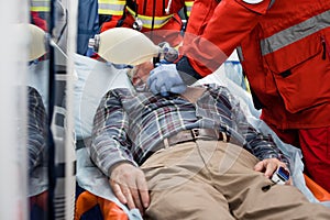 Focus of paramedics doing cardiopulmonary resuscitation photo