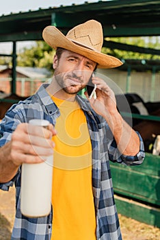 Focus of rancher in straw hat