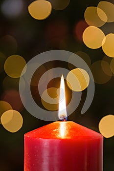 Focus on red christmas candle