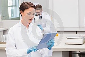 Focus scientist using tablet pc