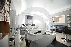 Focus on sink for washing hair. Beauty salon