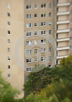 In focus: social housing. In german `Plattenbauten`. Portrait format.