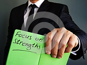 Focus on Strengths sign in the  notebook