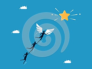 Focus on success. man team leader with angel wings flying to the star