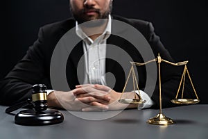 Focus symbols of justice on blurred background of lawyer. equility