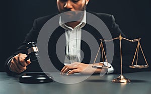 Focus symbols of justice on blurred background of lawyer. equility