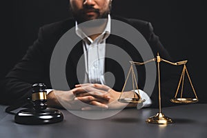 Focus symbols of justice on blurred background of lawyer. equility