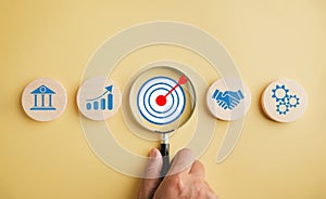 Target icon under magnifying glass