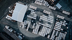 Focus on toxic fumes spread from the roof of an industrial plant. Industrial plants emit large amounts of white smoke from the fac