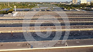 Focus on toxic fumes spread from the roof of an industrial plant. Industrial plants emit large amounts of white smoke from the fac