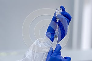 Focus on vaccine test tube of COVID19, Coronavirus or Novel corona virus epidemic disease.