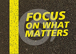 Focus on what matters written on the road.