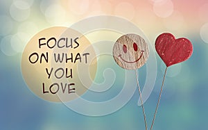 Focus on what you love with heart and smile emoji