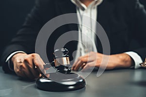 Focus wooden gavel with burred background of lawyer. equility