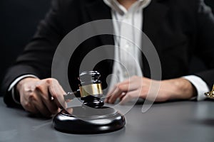 Focus wooden gavel with burred background of lawyer. equility