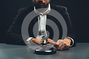 Focus wooden gavel with burred background of lawyer. equility