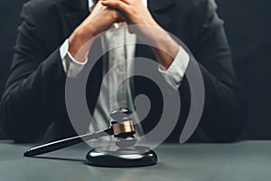 Focus wooden gavel with burred background of lawyer. equility