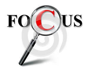 Focus word concept with magnifying glass photo