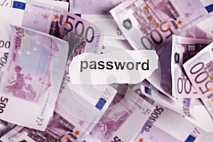 Focus on the word PASSWORD on piece of torn white paper with EUR