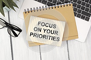 Focus on your priorities on note paper