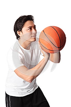 Focused basketball player in shorts and tshirt