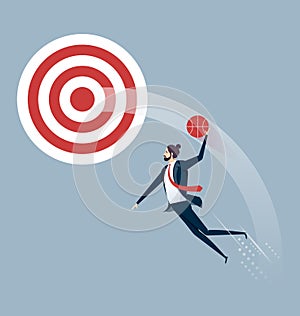 Businessman Jumps To Dunk Target-Business success concept photo