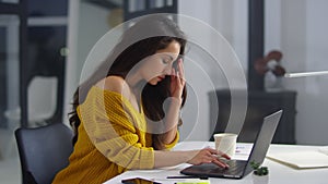 Focused business woman working laptop in office. Businesswoman typing computer