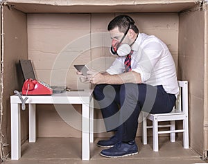 Focused businessman watching something on the mobile device