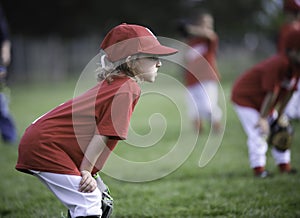 Focused child ready to play ball