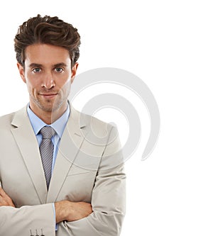 Focused on the corporate prize. Studio portrait of a handsome young businessman isolated on white.