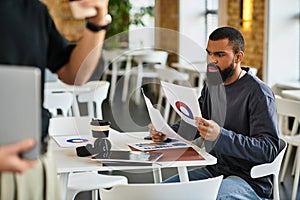 Focused discussion takes place in a photo