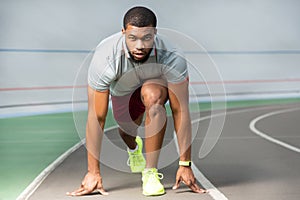 Focused fit professional young African American male runner