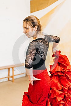 Focused flamenco woman dancer training